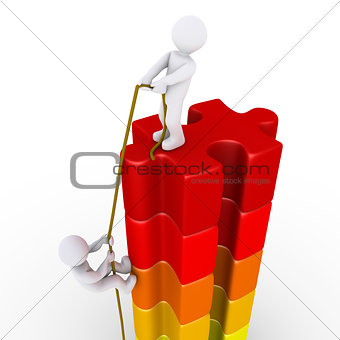 Person helping another to reach the top
