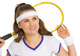 Dreamy tennis player with racket