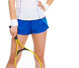 Closeup on tennis player with racket