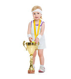 Portrait of baby in tennis clothes with medal and goblet
