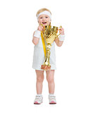 Happy baby in tennis clothes holding medal and goblet