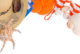 orange sandals and seashells frame