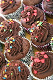 Chocolate cupcakes with cream.