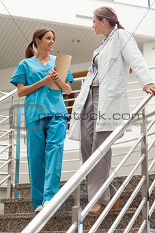 Female doctor talking to an intern