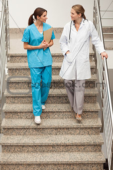 Health specialists going down the stairs