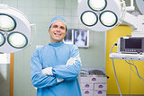 Smiling surgeon in operating theatre