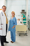 Doctor and nurse standing in a hospital room
