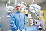 Male surgeon posing in an operation theater
