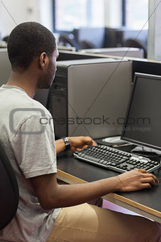 Man sitting at a computer