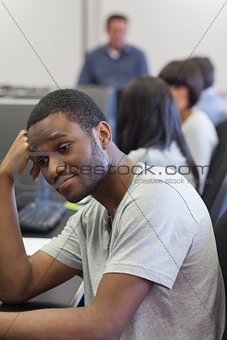 Man turning away from computer class