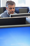 Man concentrating at computer
