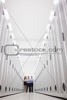 Technicians standing at end of hallway