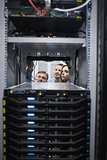 Technicians looking into servers