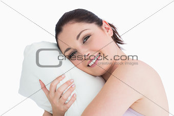 Woman waking up on her pillow