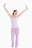 Standing woman stretching and yawning