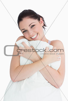 Woman holding a pillow