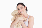 Woman holding a teddy bear