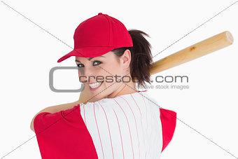 Woman ready to play with baseball bat