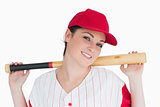 Woman holding a bat on her shoulders