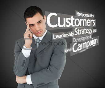 Thoughtful businessman with hand on head