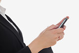 Midsection of woman using cell phone