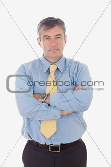 Portrait of businessman with arms crossed