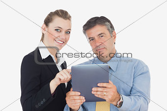Portrait of business people with digital tablet