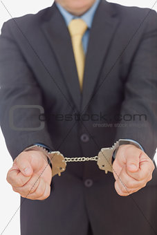 Businessman with handcuffs