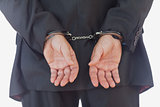 Closeup of handcuffed businessman