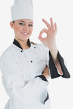 Female chef gesturing ok sign
