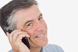 Portrait of businessman using cell phone