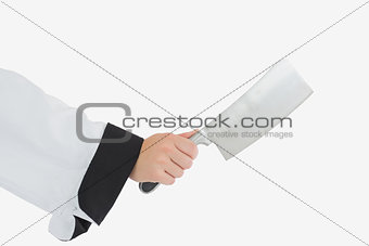 Chef holding meat cleaver