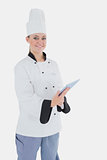 Female chef with digital tablet