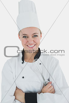 Chef holding wire wisk
