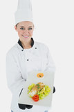 Female chef offering healthy food