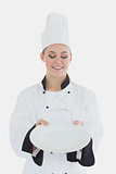 Chef holding an empty plate