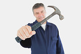 Technician holding hammer