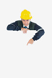 Repairman pointing at billboard