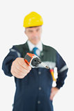 Repairman holding cordless drill