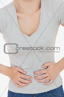 Woman suffering from stomach