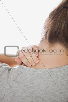 Cropped image of woman suffering from neckache