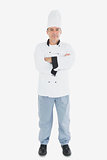 Portrait of mature chef with arms crossed