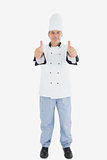 Portrait of mature male chef gesturing thumbs