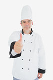 Mature chef showing thumbs up sign