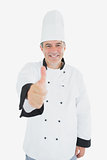 Mature chef gesturing thumbs up