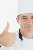 Cropped image of chef gesturing thumbs up