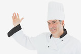 Portrait of mature chef gesturing