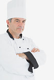 Confident chef with arms crossed