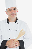 Confident chef holding spatula