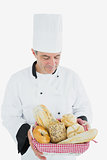 Male chef with bread basket
